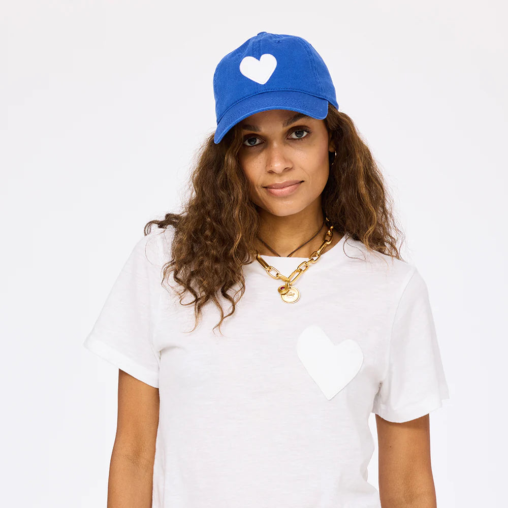 KR262-0625_baseball_cap_with_heart_1240x.progressive_795201db-f00e-464f-a3f7-38a8d7b55e11